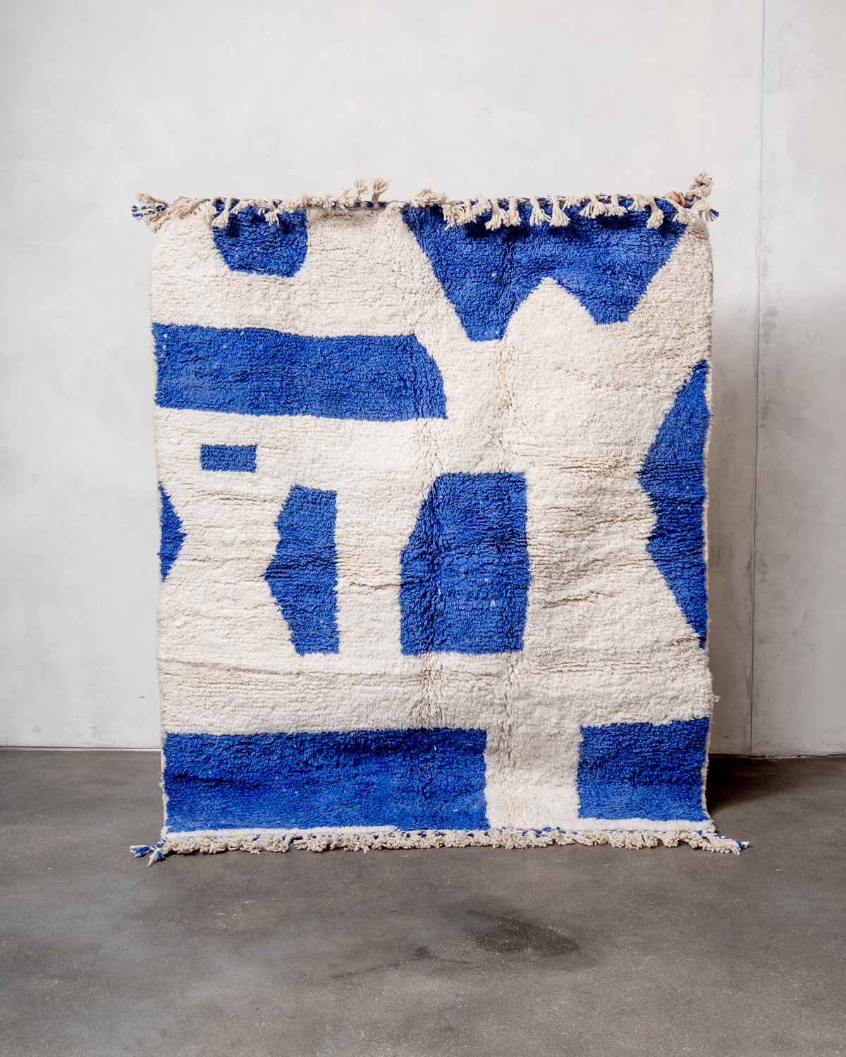 Modern, designer, handcrafted Berber rug from Morocco. Beniourain carpet with beautiful colours and patterns and fluffy wool texture.
